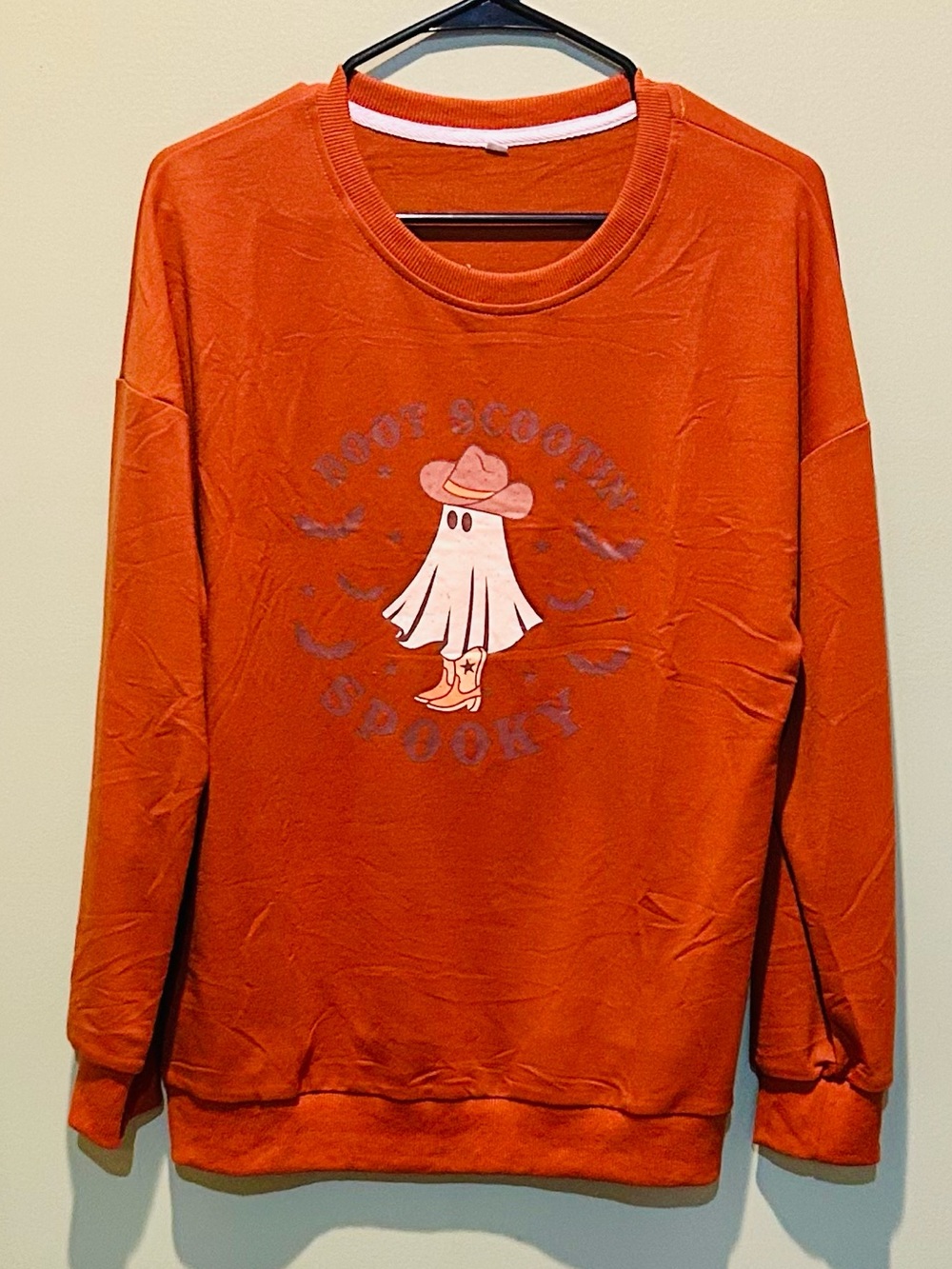 Women’s Orange Graphic Pullover Sweater “Boot Scootin’ Spooky”
